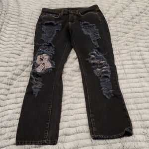 Dark wash distressed Carmar jeans size 24